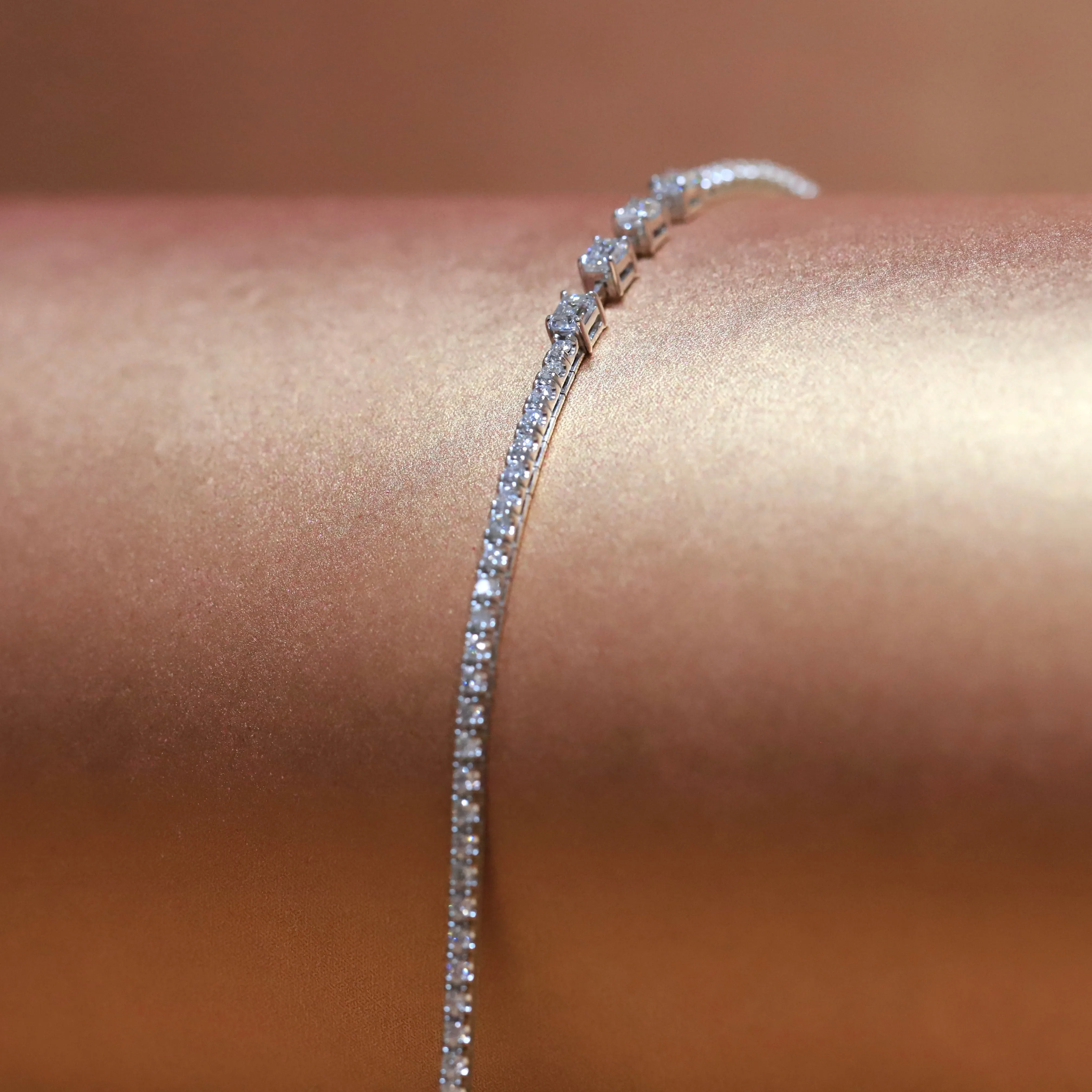 18ct White Gold Diamond Bracelet with Emerald Cut and Round Brilliant Cut Diamonds